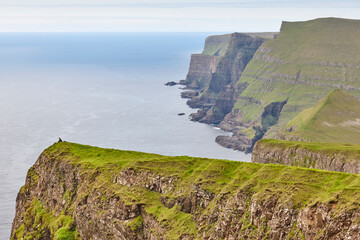 Suduroy island dramatic coastline and cliffs in Faroe archipelago. Faroese