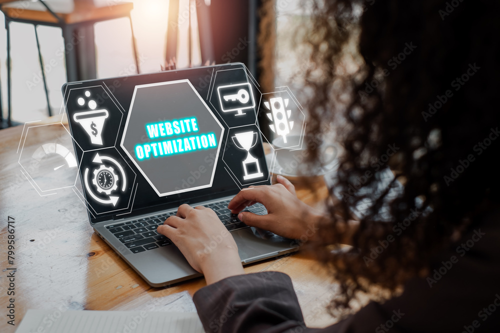 Wall mural website optimization concept, businesswoman using laptop computer on desk with website optimization 