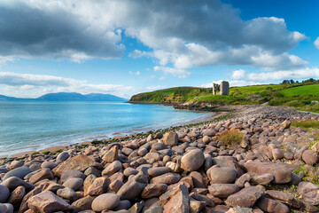 The ancient ruins of Minard Castle overlooking Kilmurry Bay