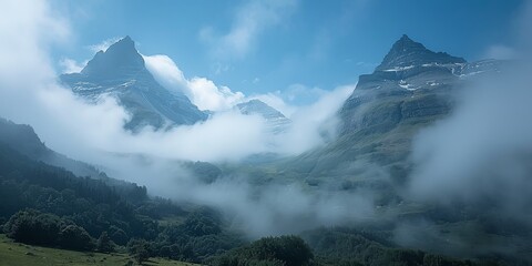 Mystic mountains veiled by swirling clouds in a lush valley, evoking the ethereal beauty of hidden landscapes