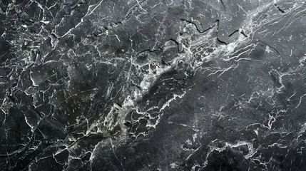 Fotobehang Elegant black marble with intricate white veins © abangaboy