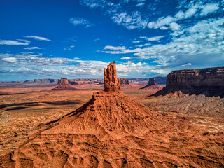 Massive Rock Formation Dominating Desert Landscape