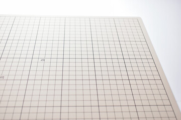 gray cutting mat board on white background with line and scale measure guide pattern for object art...