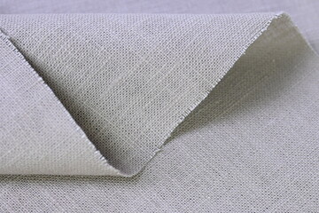 beige hemp viscose natural fabric cloth color; sackcloth rough texture of textile fashion abstract...