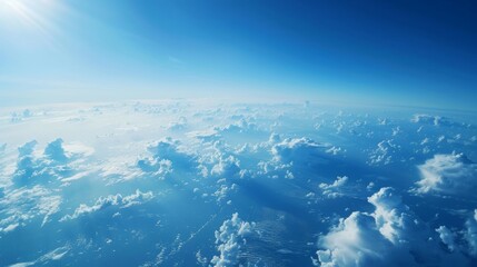 This illustration depicts the view of the sky and clouds as seen from the window of an airplane. The vast expanse of blue sky is interspersed with fluffy white clouds, creating a dynamic and ever