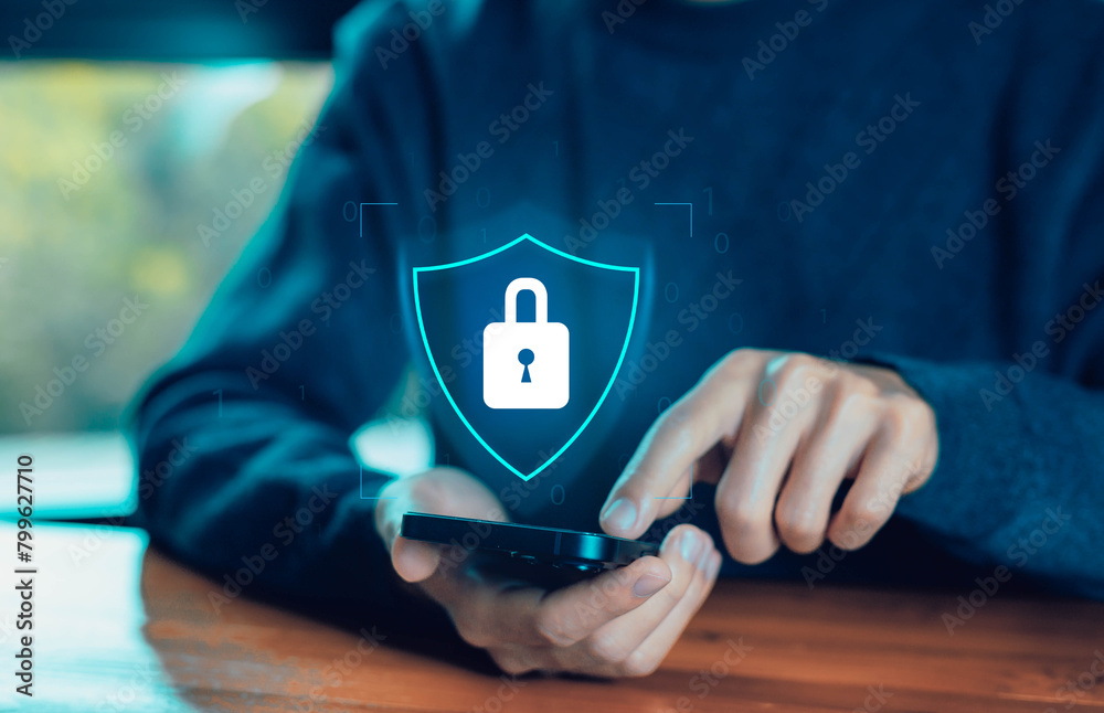 Wall mural lock mark protects attacks from a hacker on a smartphone and internet cybersecurity. concept of secu