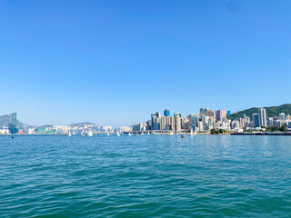 Sailboats Grace the Sparkling Waters of Victoria Harbour