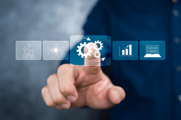 Business process automation concept. Businessman touching Automation software technology.