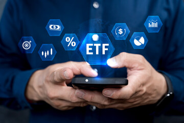 ETF, Exchange traded fund concept. Business stock market finance index fund. Businessman using smartphone.