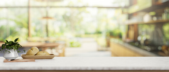 A luxury white marble kitchen tabletop in a contemporary spacious home kitchen.