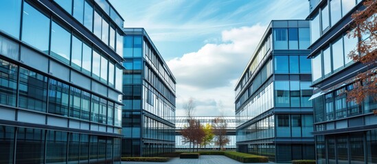 Fototapeta premium A city skyline with tall buildings and a clear blue sky