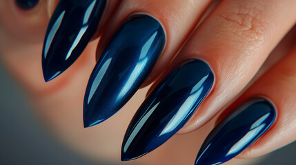 Beautiful manicure blue long nails closeup 