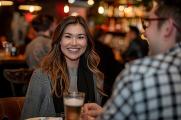 Young Woman Socializing at Business Casual Event. Young professional woman with a radiant smile engages in conversation at a business casual networking event in a modern bar setting.