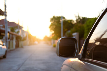 close up car on street automotive roadtrip on sunset background for transport, travel of nature to...