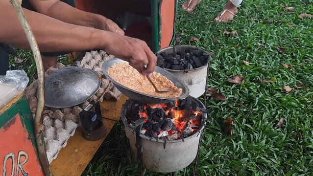 Kerak telor or Egg Crust. kerak telor is Spicy Glutinous Rice Omelette with Grated Coconut.
made from glutinous rice cooked, egg, serundeng, fried shallots and dried shrimp topping.