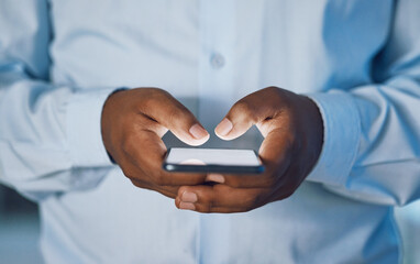 Man, hands and typing with phone for news, social media or online browsing at office. Closeup of...
