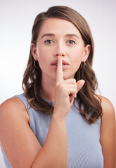 Woman, studio and portrait or finger on lips, hush and secret for privacy information or drama with gossip news. Whisper, opinion and quiet with hand gesture for silence, emoji and confidential