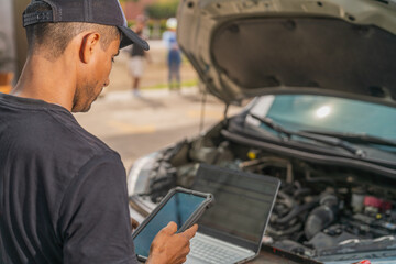 Innovative garage repair using electronic devices in a rural town