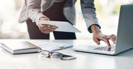 Tablet, typing and hands of woman at laptop for research, business review or online report at agency. Budget, planning and consultant at desk with computer, networking and financial risk management