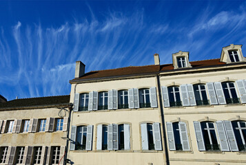 Fototapeta na wymiar Beaune, Department of Cote d'Or, Côte-d’Or, Burgundy, Bourgogne-Franche-Comté, France, Europe - traditional French townhouses against blue sky