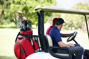 Men, golf cart and driving on lawn for workout with sunshine, sportswear and exercise. Male...