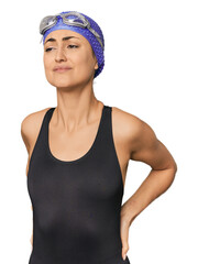 Young Caucasian female professional swimmer suffering a back pain.