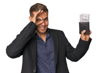 business caucasian man holding tickets excited keeping ok gesture on eye.