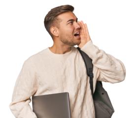Young student man with a laptop shouting and holding palm near opened mouth.