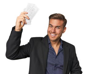 Happy young man holding money bills in a studio backdrop