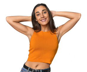 Hispanic young woman stretching arms, relaxed position.