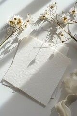 
blank square mother's day card product shot with a clean backdrop, the material for the card is white linen embossed, studio lighting, product photography