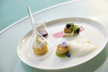 Elegant desserts served with a scenic sea view