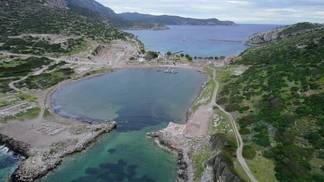 datca knidos ancient city aerial drone video blue sea cloudy sky