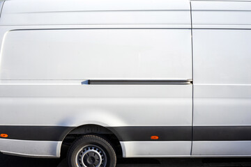 Sleek White Delivery Van Side Profile, Spacious Vehicle for Urban Logistics