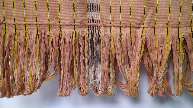 Handmade woven with unique pattern from Indonesia, textured multicolor ethnic fabric background