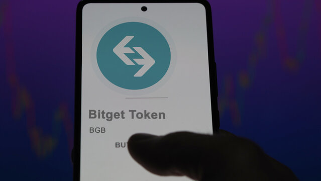 Close up on logo of (BGB) Bitget Token on the screen of an exchange. (BGB) Bitget Token price stocks, $BGB on a device.