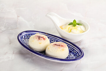 Curd pancakes with sour cream