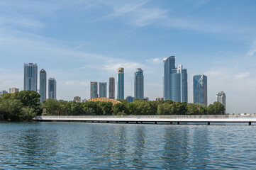 Panorama of the center of the Emirate of Sharjah, United Arab Emirates . Corniche area of Sharjah, UAE city.