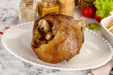 Baked pork knee with spices