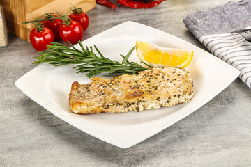 Baked salmon fish served rosemary