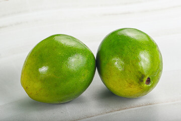 Two ripe green exotic avocado fruit