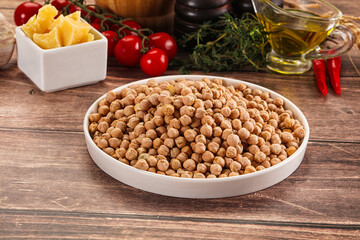 Dry chickpea seeds heap in the bowl