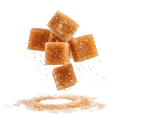 Brown sugar cubes flying on transparent background
