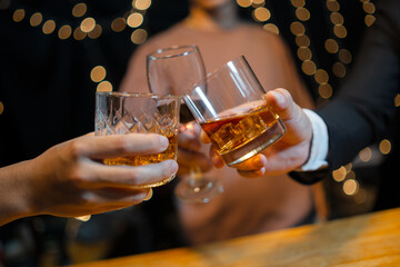 Barman pouring whiskey whiskey glass beautiful night