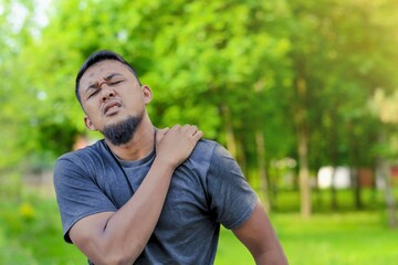 Man back neck and shoulder pain, inflammation of muscles and ligaments rupture during sports,...