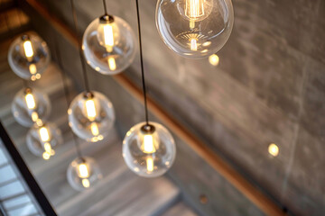 Series of Italian light fixtures across a retail space enhancing shopping experience.