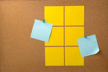 Blank sticky note paper on cork board wall. Noticeboard to organize life and work concept