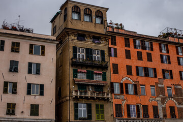Colorful traditional houses in the harbor of the Old Town of Genoa, Architecture of the city of Genoa, Liguria, Italy 
