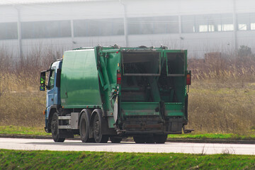 garbage truck ensures a cleaner city on a sunny day