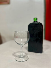 Homemade square bottle of red wine